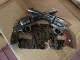 Get your guns ! Wanddecoratie met pistolen