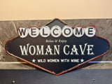 Metalen wandbord Welcome Woman Cave
