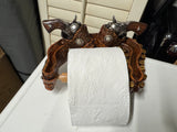Wc rolhouder met pistolen