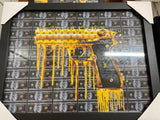 Glasschilderij Golden Gun met druppels