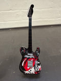 Miniatuur gitaar van de Rolling Stones