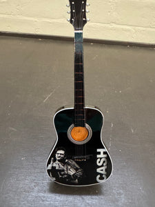 Miniatuur gitaar van Johnny Cash