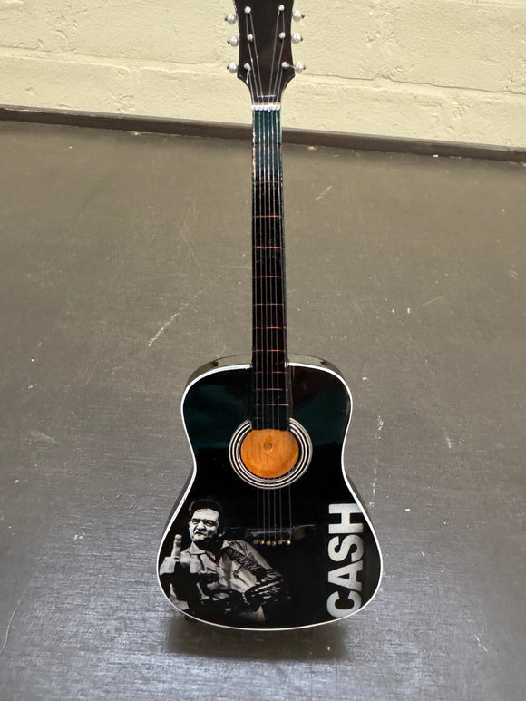 Miniatuur gitaar van Johnny Cash