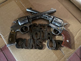 Get your guns ! Wanddecoratie met pistolen