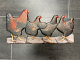 Metalen wandbord met kippen