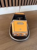 Metalen decoratie botsauto